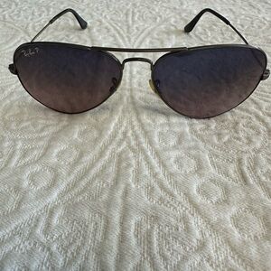 Dark colored RayBans in good shape. Original case not included